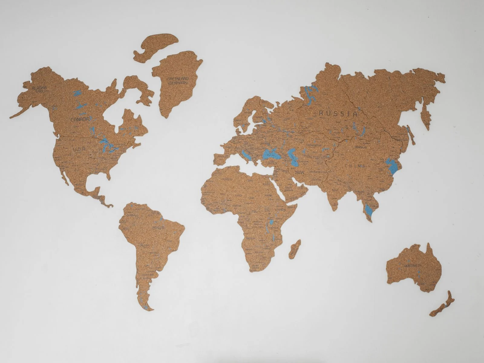 Laptop showing a world map, representing students joining from many countries