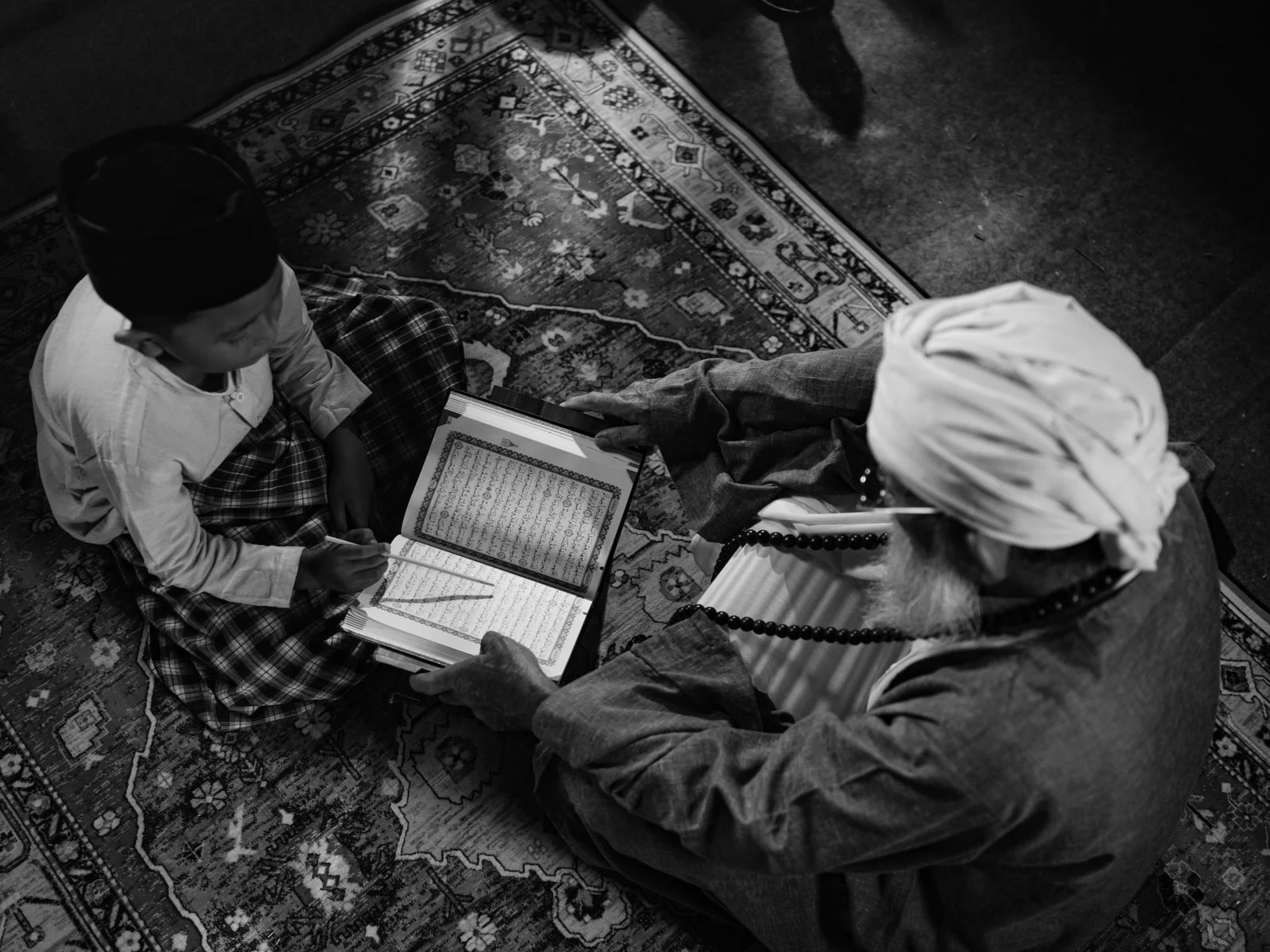 Student reciting the Quran to a senior teacher for Ijazah