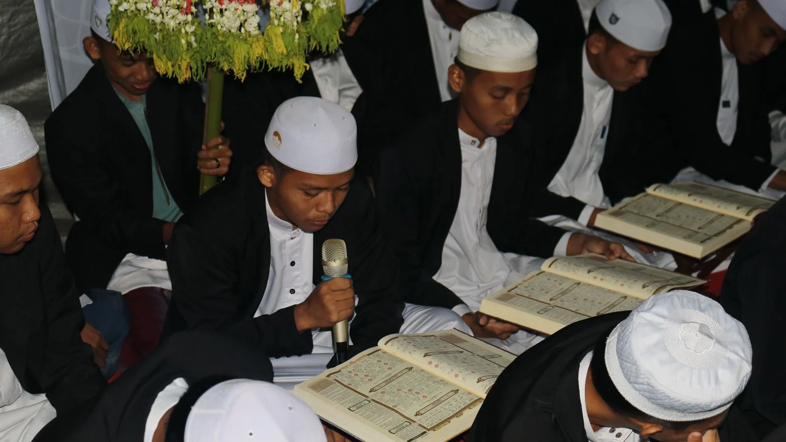 Students reading the Quran together while preparing for Ijazah